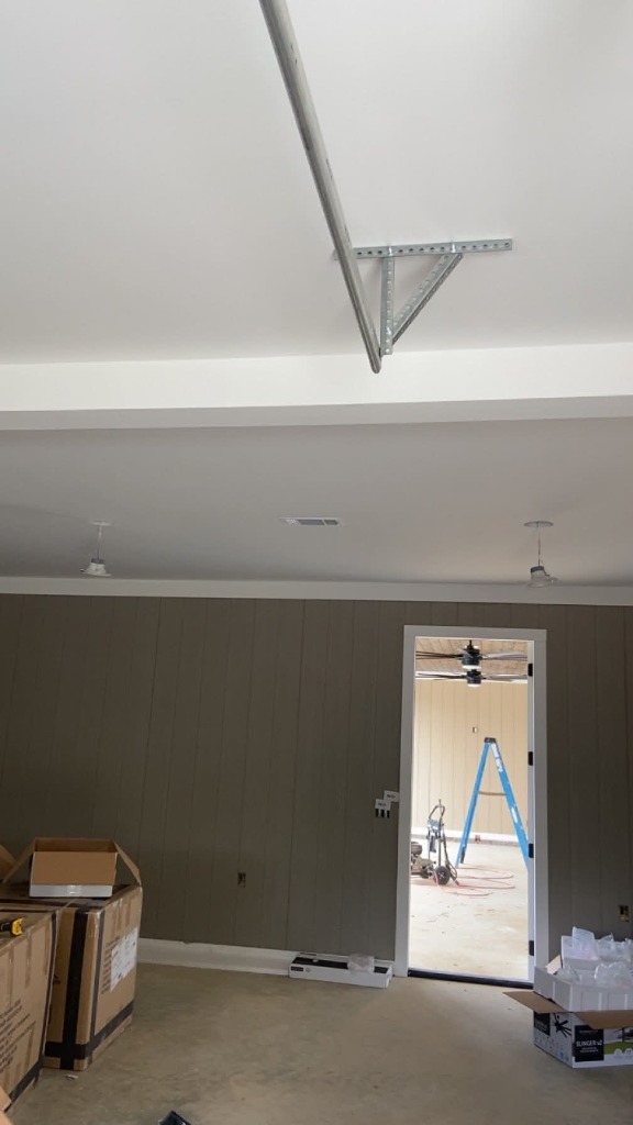 Finished painted bonus room interior and trim work